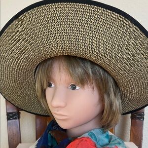 Elegant Women's Straw Hat with Black Trim